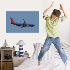23x36 Southwest 737 Landing Poster Displayed in Boys Room
