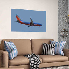 31x48 Southwest 737 Landing Poster Displayed Above Sofa