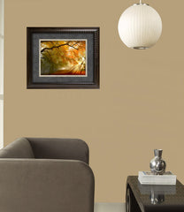 Forest Light Framed Art Installed in Living Room Next to Chair