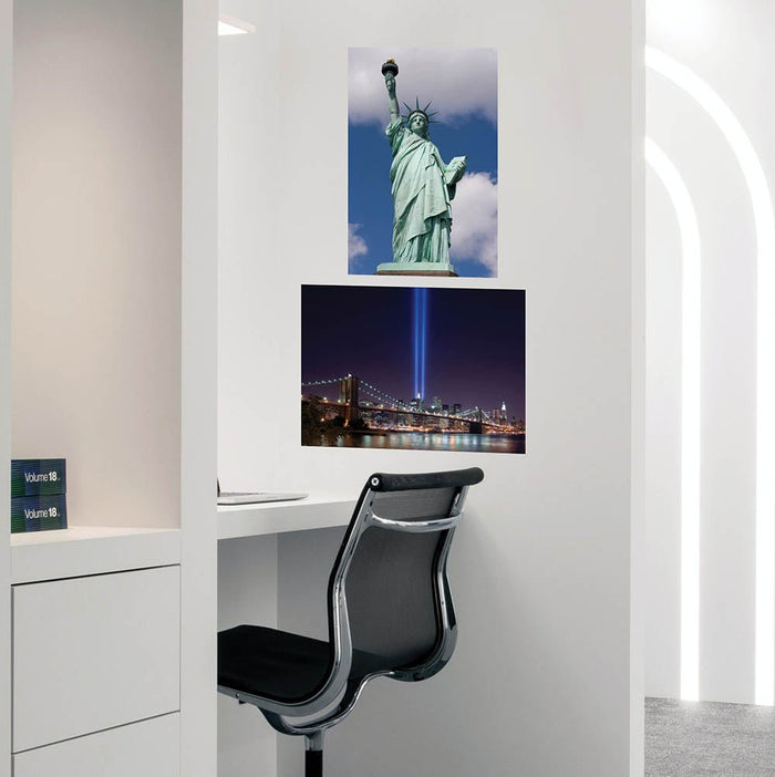 16x24 inch Statue of Liberty Against Blue Sky Poster Installed in Office Cubicle